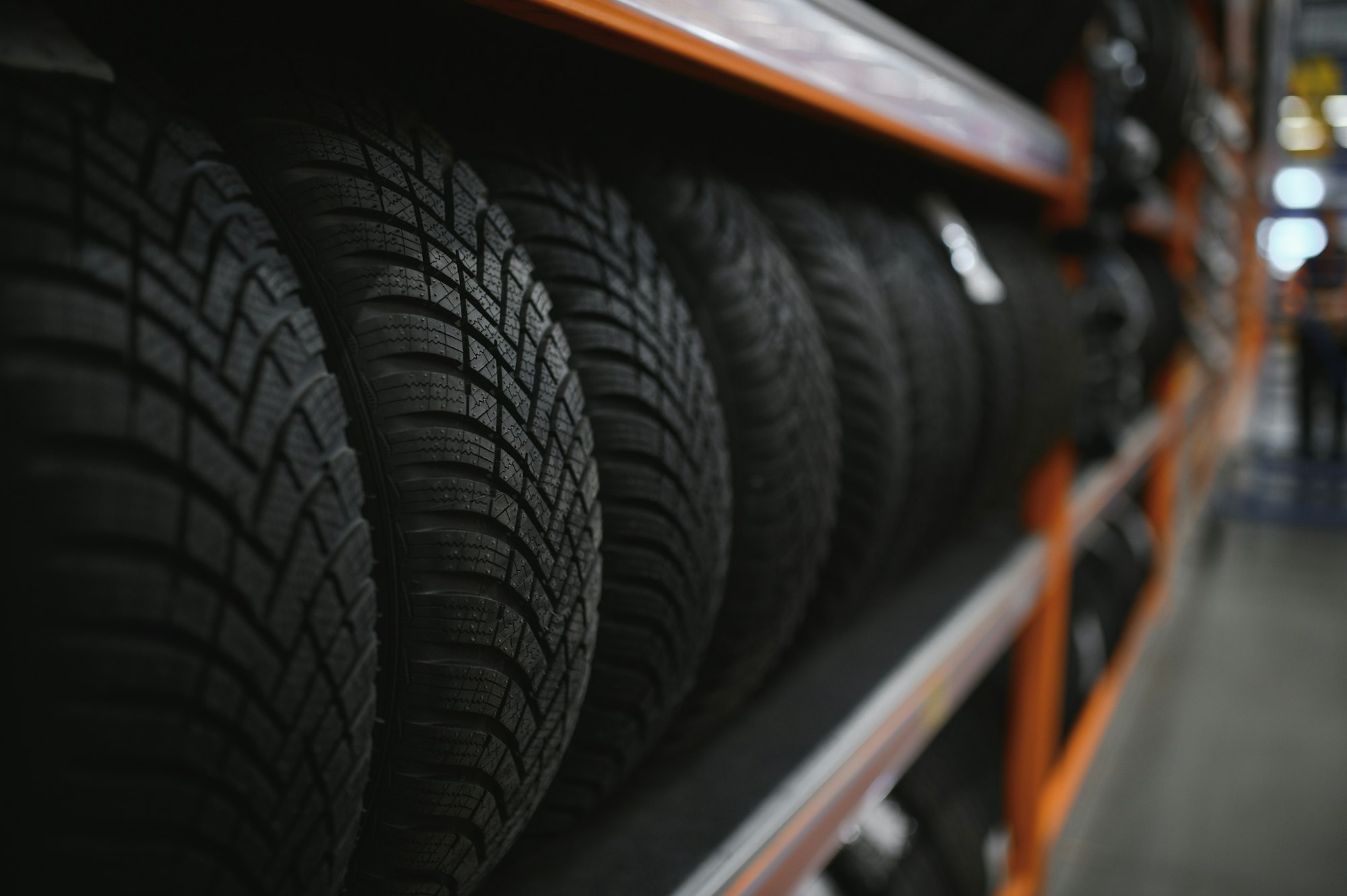 Car tires at warehouse in tire store